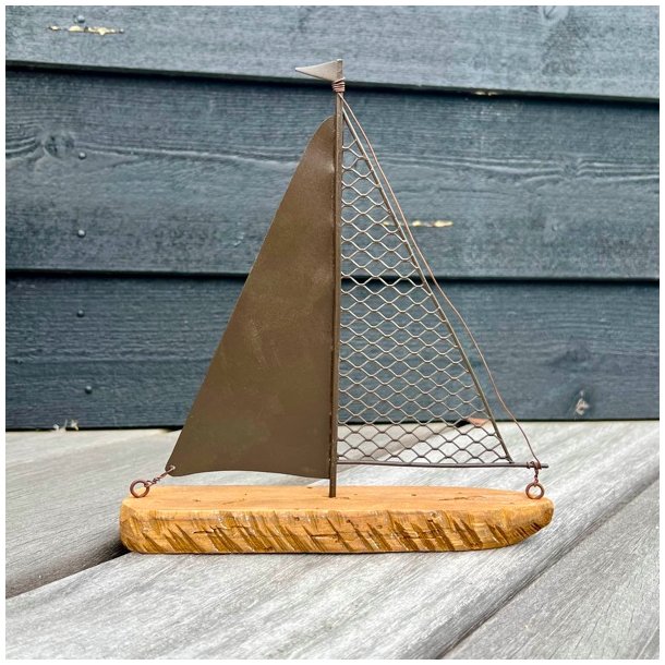 Sejlskib i drivtmmer og jern