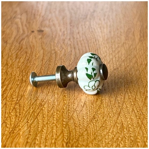 Mbelknop - lille porceln med antik top/sokkel