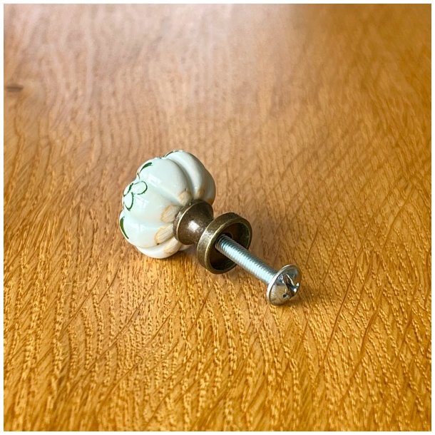 Mbelknop - lille porceln med antik top/sokkel