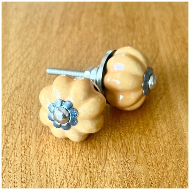 Mbelknop - porceln sennepsgul og slv 