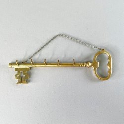 Ngleholder i messing 