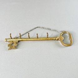 Ngleholder i messing 