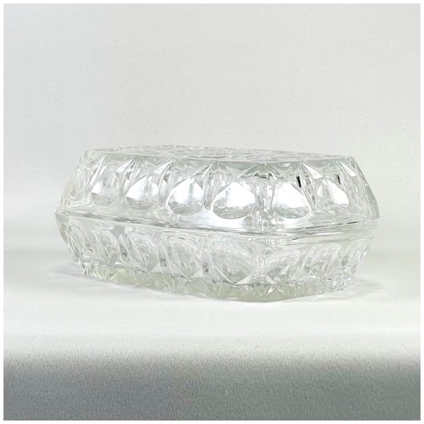 Smrboks i presset glas 