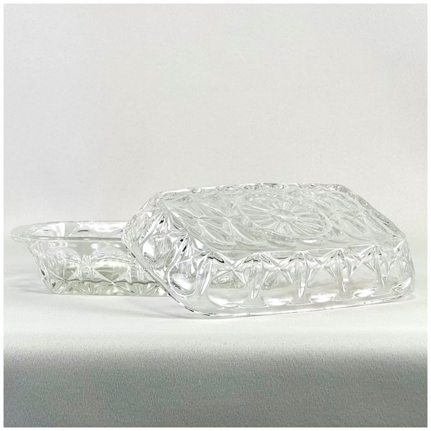 Smrboks i presset glas 