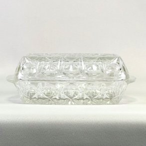 Smrboks i presset glas 