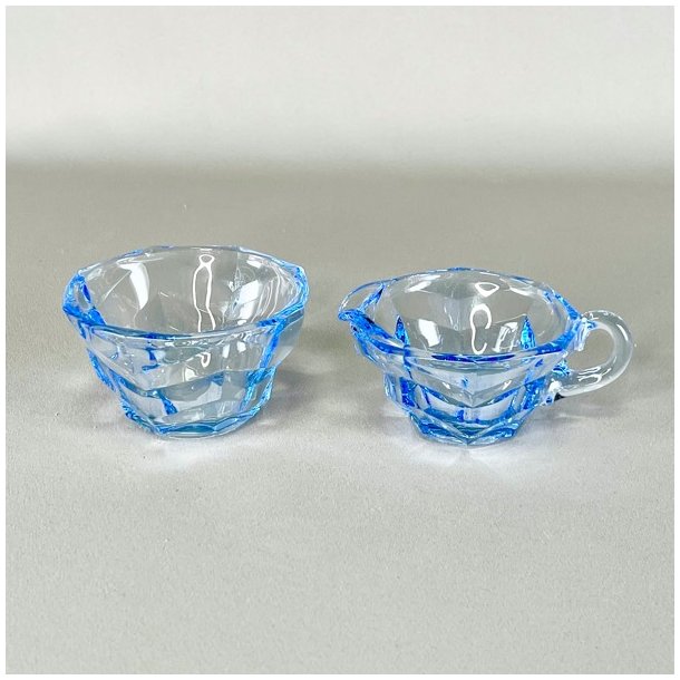 Sukker og flde st - lyseblt glas