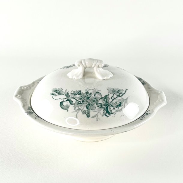 Terrin med lg - grn blomst