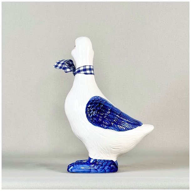 Andefigur i porceln med blt bnd